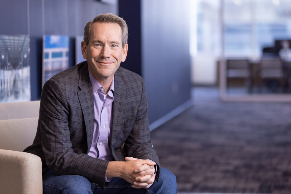 portrait of a smiling person in professional attire